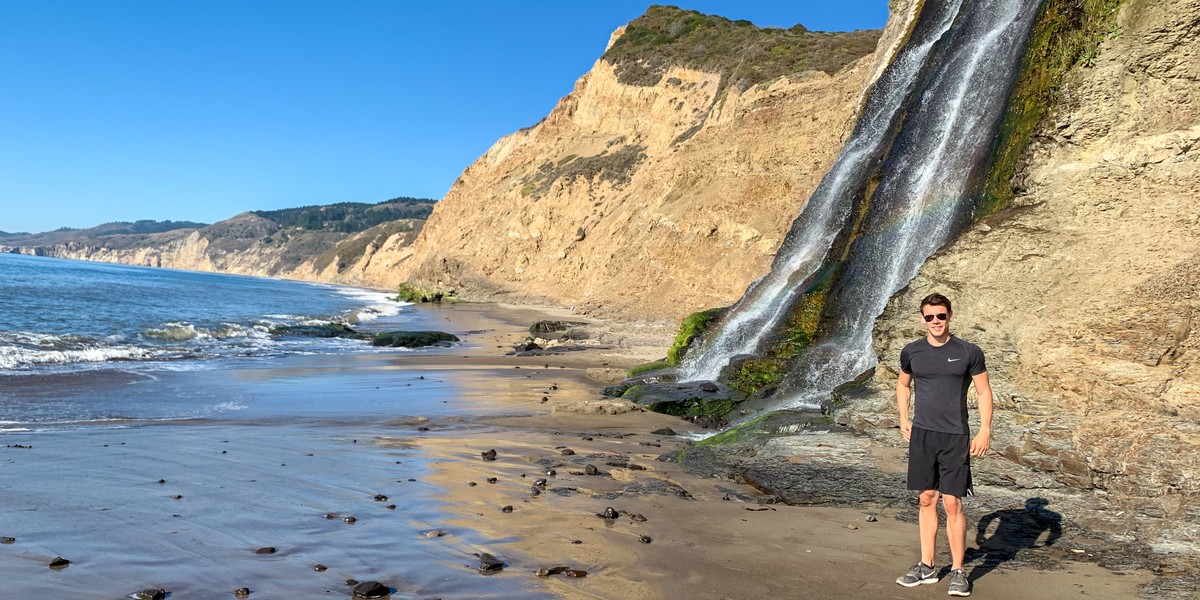 David standing at the base of Alamere Falls waterfall